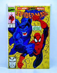 Comic book cover featuring Spider-Man and a blue creature with 'Marvel Comics' branding.