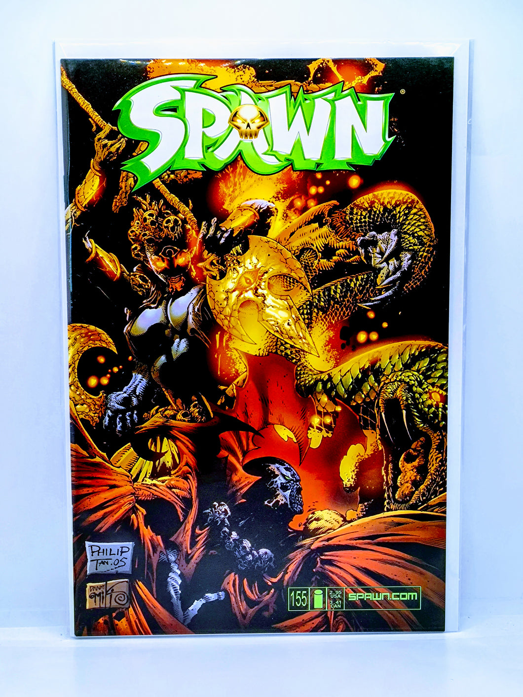 Comic book cover featuring the title 'Spawn' with vibrant colors and dynamic artwork.