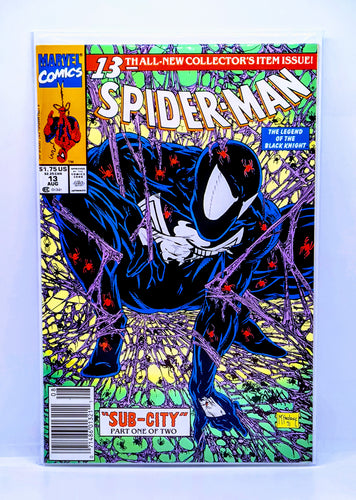 Comic book cover featuring Spider-Man in a blue suit with red accents on a white background