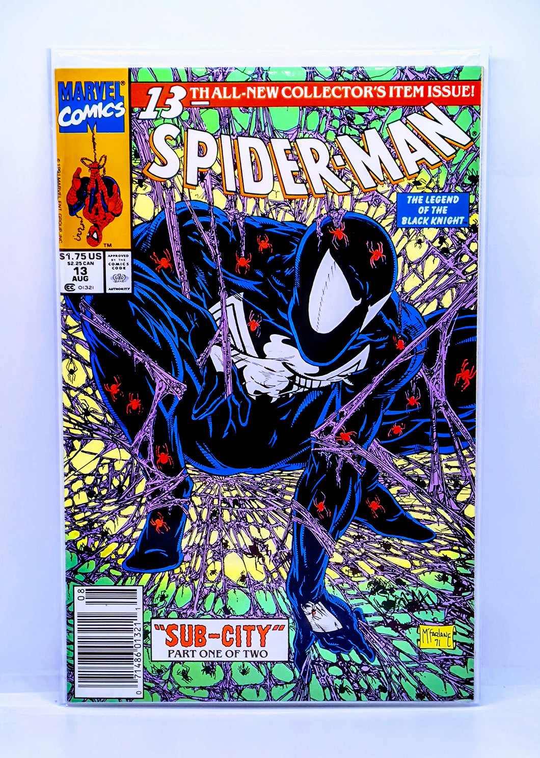 Comic book cover featuring Spider-Man in a blue suit with red accents on a white background