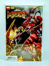 Load image into Gallery viewer, Comic book cover featuring two characters in a battle scene with &#39;Out of Carve&#39; and &#39;Misery&#39; text.
