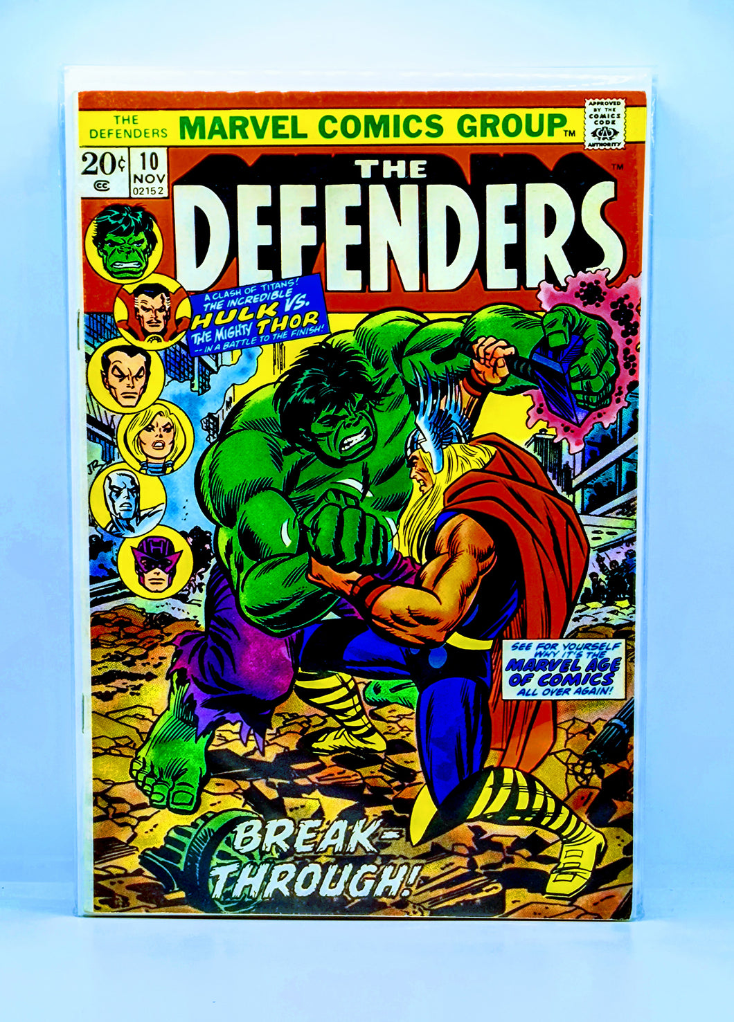 Vintage comic book cover featuring 'The Defenders' with Hulk and other characters on a blue background